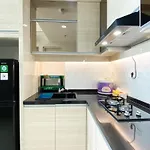 Modern Look And Comfy 2Br Vasanta Innopark Apartment By Travelio
